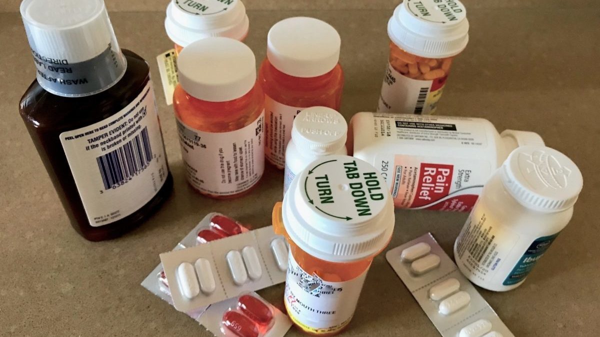 bottles and blister packs of prescription and OTC medications