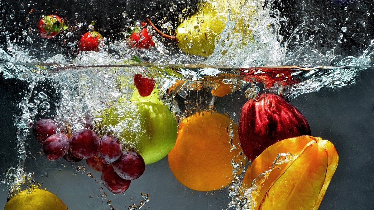 fruit splashing into water