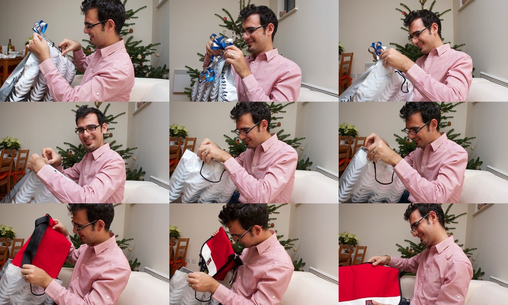 Man opening Christmas gifts