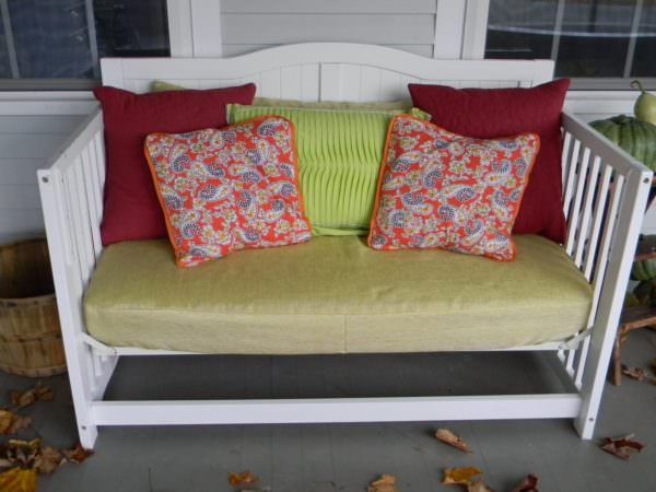 Baby crib turned front porch daybed
