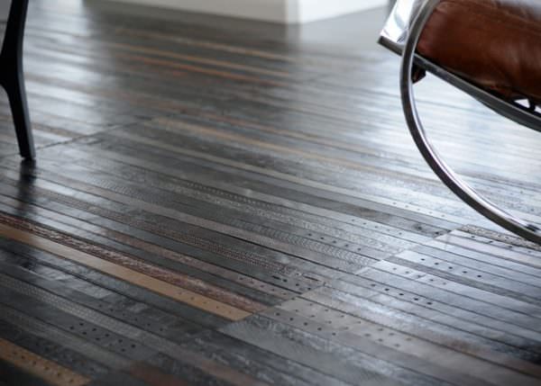 Upcycled belts made into flooring