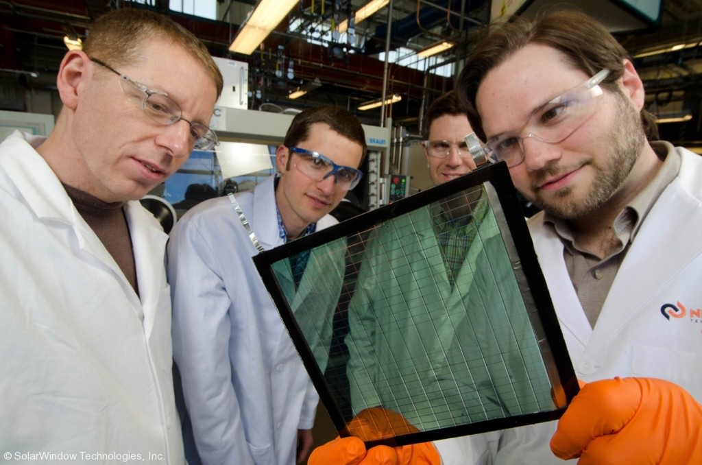 Engineers inspecting SolarWindow™ Spray-On Solar Panel