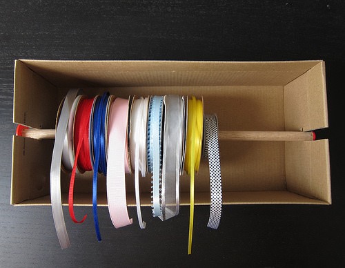Upcycled shoebox made into ribbon holder