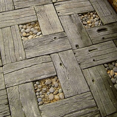 Wood walkway pavers crafted from repurposed wood