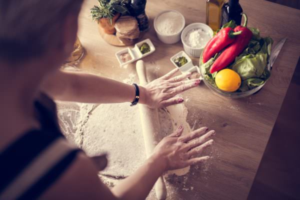 Woman cooking healthy balanced green living food