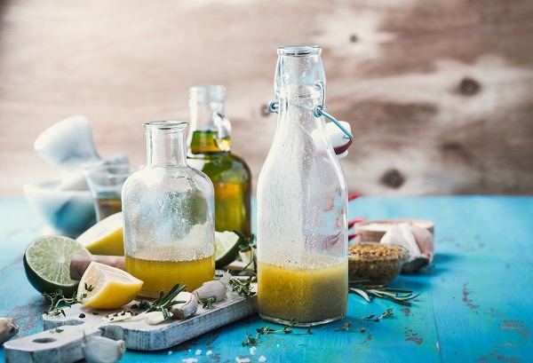 Make your own oil and vinegar dressing, perfect for drizzling on salads. Photo credit: Shutterstock.com