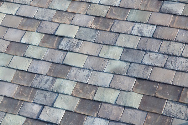 You'd be hard-pressed to guess these slate glass tiles are actually solar tiles. Photo credit: Tesla