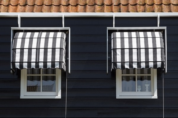 Windows that face south and west are good candidates for awnings. Photo: Shutterstock.com