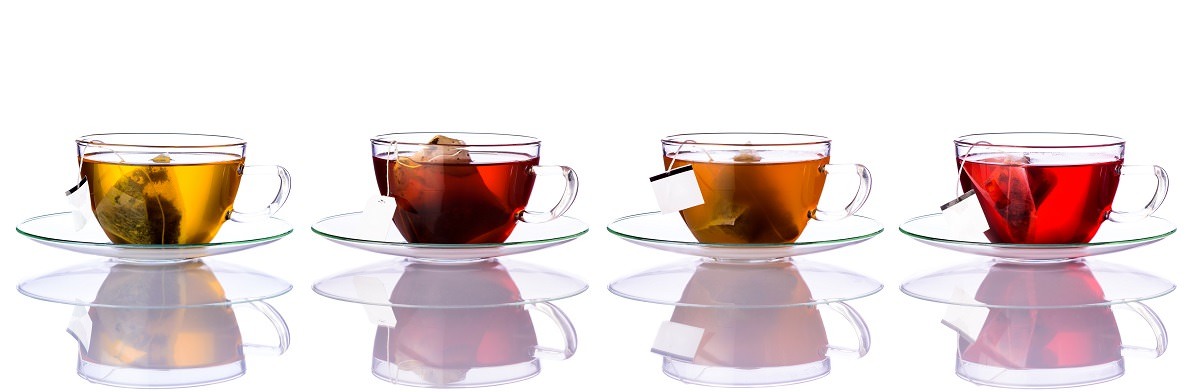glass cups of different types of tea