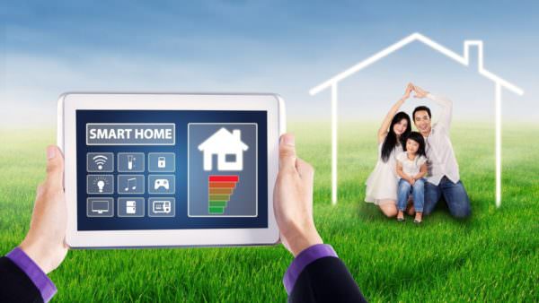 Smart house controller on tablet and happy family