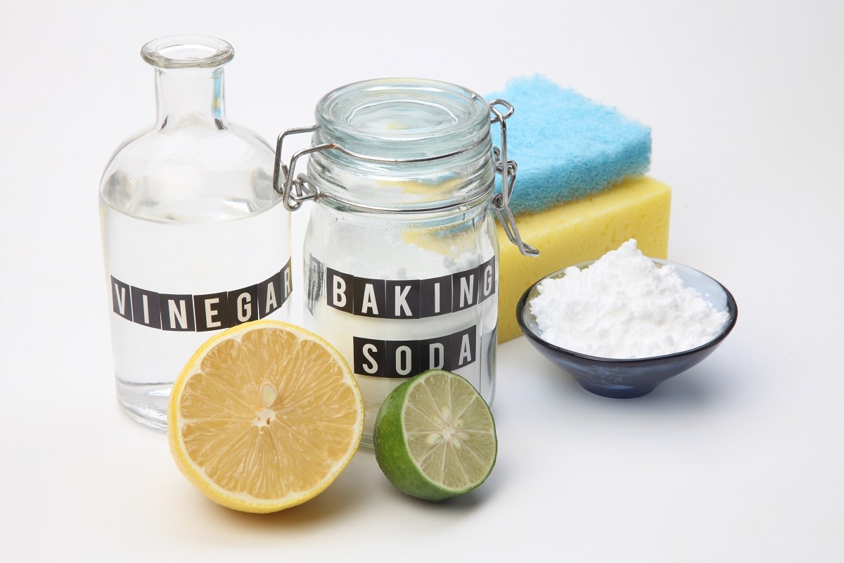 Homemade green cleaning with vinegar, baking soda, lemon and lime