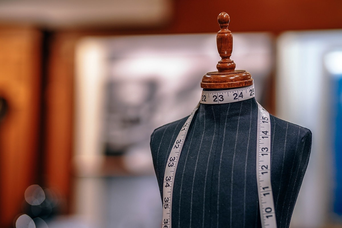 tailor's dummy with measuring tape