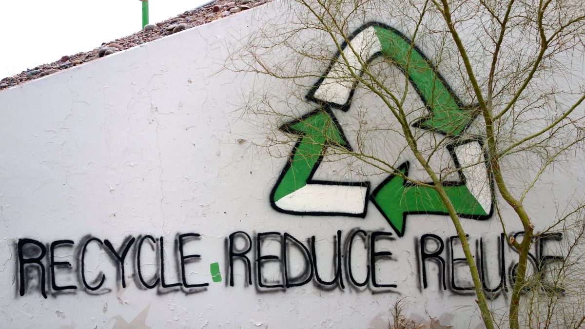 "Recycle, Reduce, Reuse" painted on wall