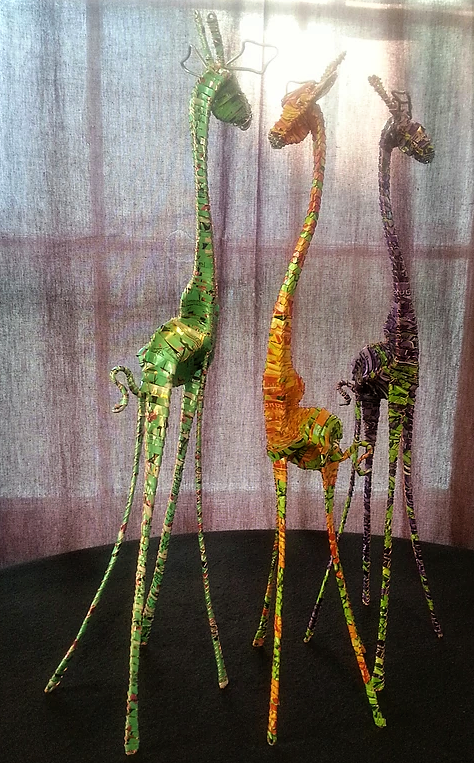Giraffe statues by Shumba Masani made from aluminum cans and wire