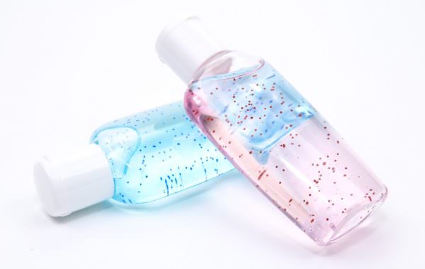 Bottles of lotion containing microbeads