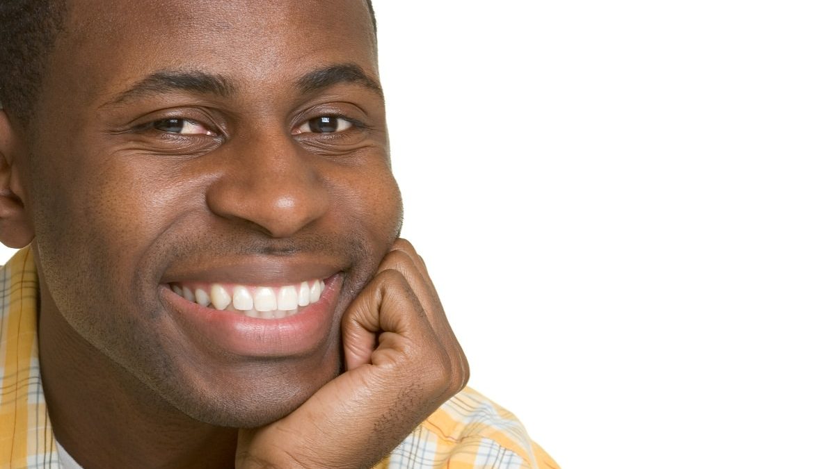 smiling man with white, healthy teeth