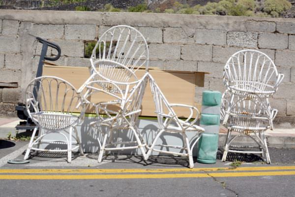 discarded patio chairs
