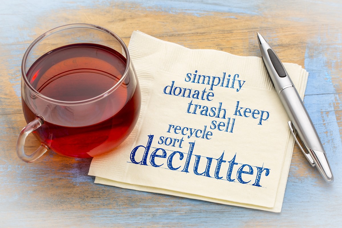 declutter and simplify word cloud on a napkin with a cup of tea