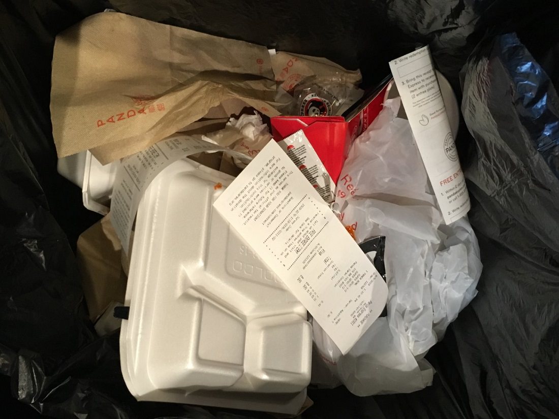 polystyrene food containers, plastic bags, and other fast food waste