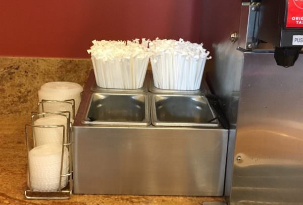 plastic cutlery, lids, and straws