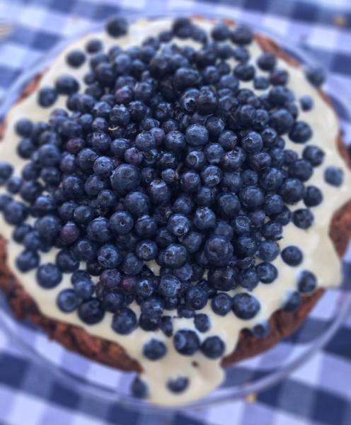 blueberry-topped carrot cake with cream frosting