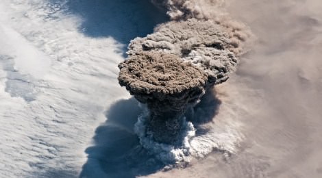 aerial view of Raikoke volcano erupting