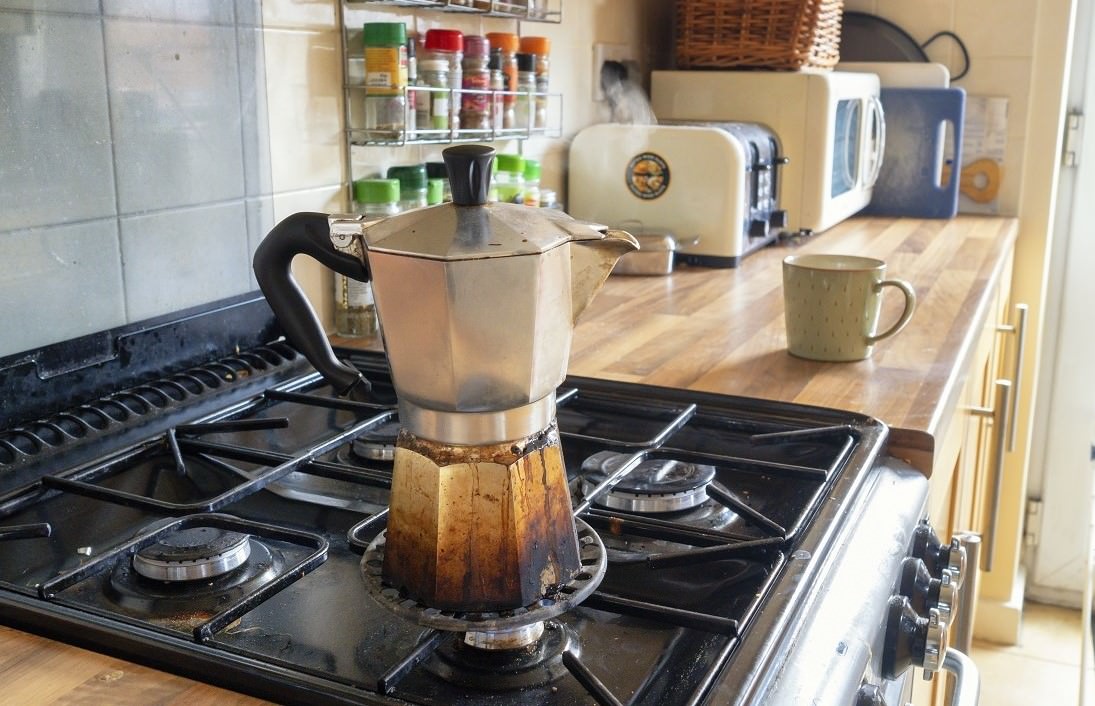 stovetop expresso coffee maker on the gas stove