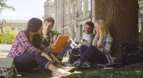 students talking outside on college campus