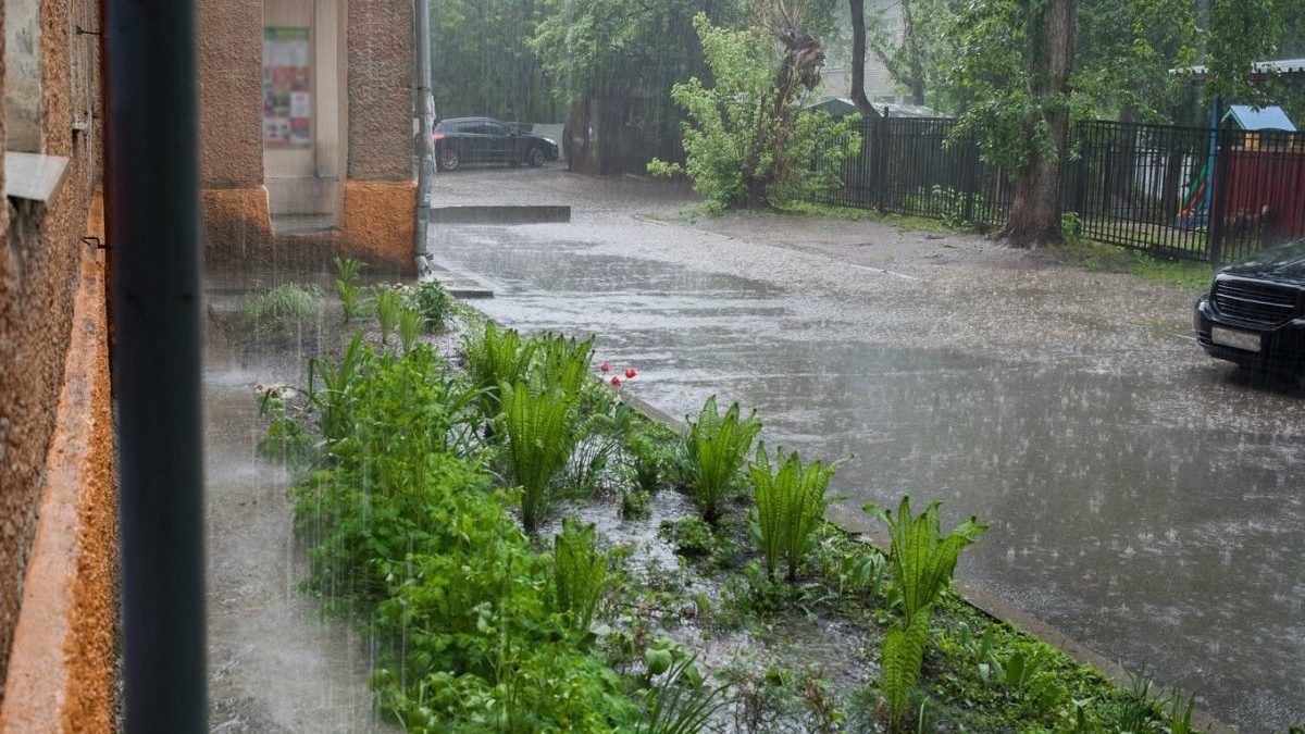 pouring rain residential neighborhood