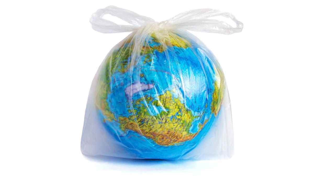 globe of earth encased in plastic bag