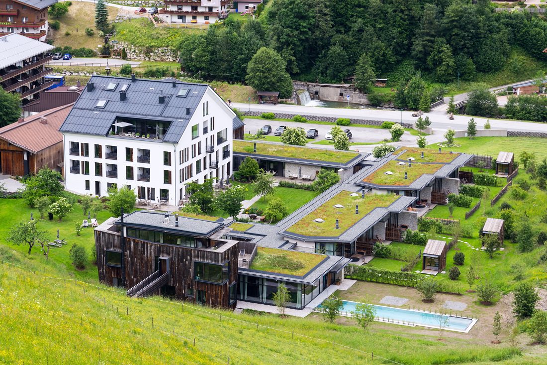 aerial view of homes with green roofs