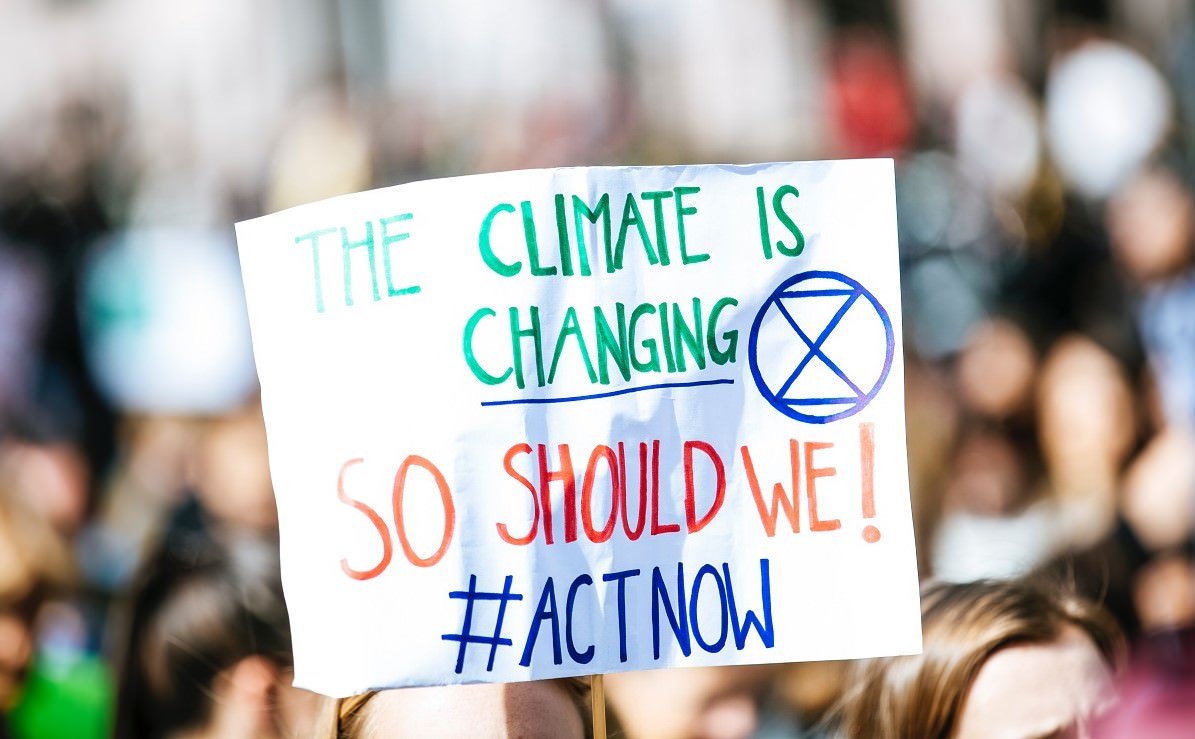 sign at climate change demonstration