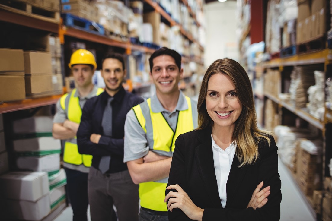 business managers and warehouse workers