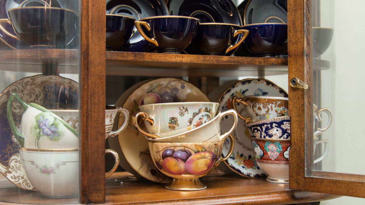 teacups in china cabinet