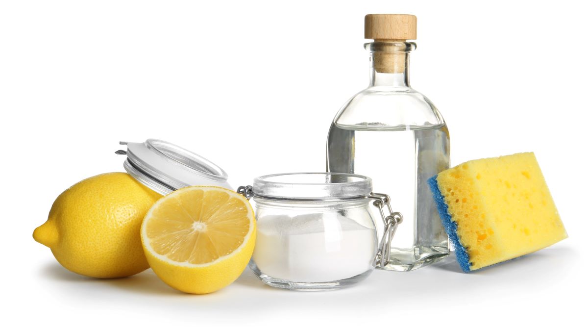 lemon, baking soda, vinegar, and sponge