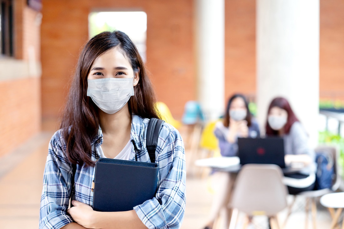 college students wearing protective masks