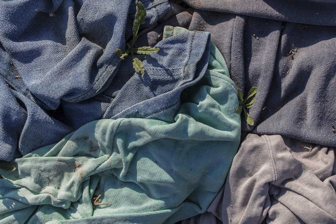 pile of discarded clothing