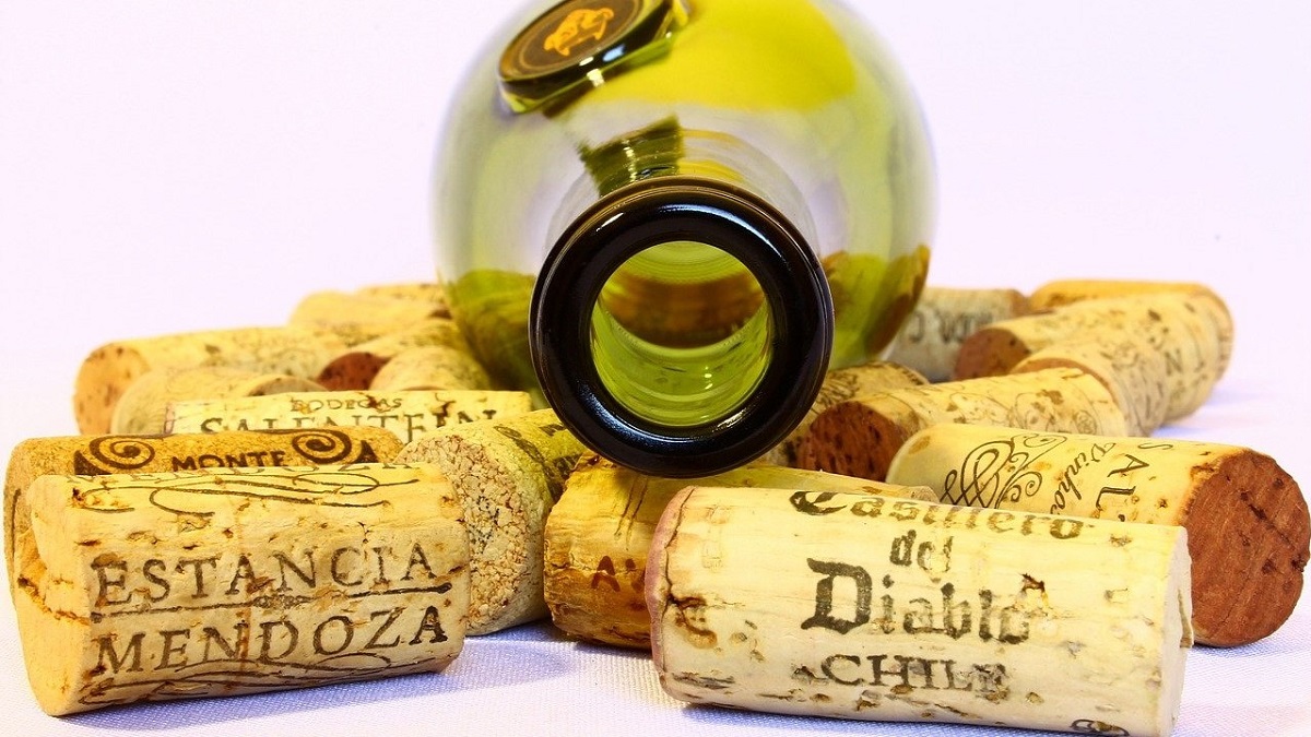 empty wine bottle and corks