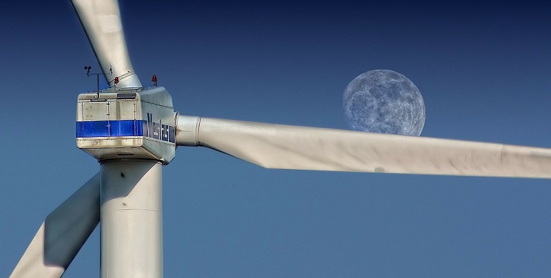 wind turbine with moon in background