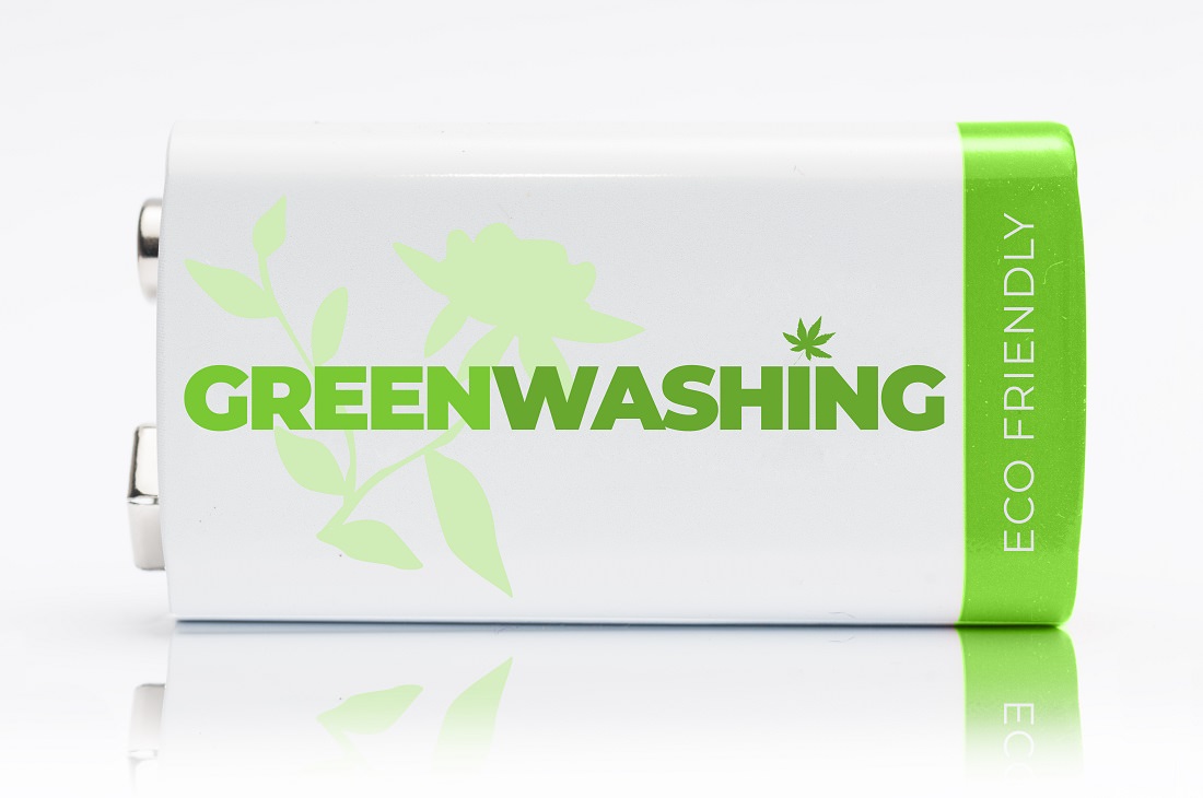 battery with words "Greenwashing" and "eco-friendly" printed on it