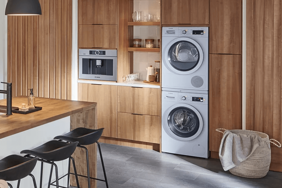 Stacked washer-dryer set from Bosch in contemporary kitchen