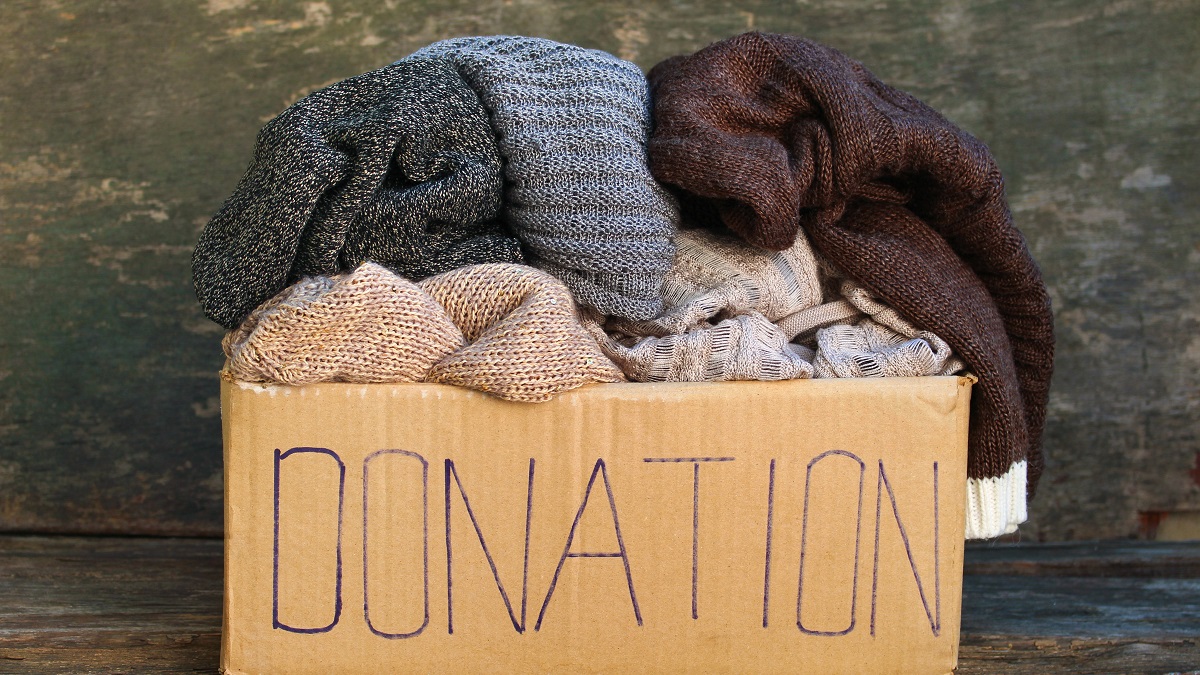 Donation box filled with old sweaters