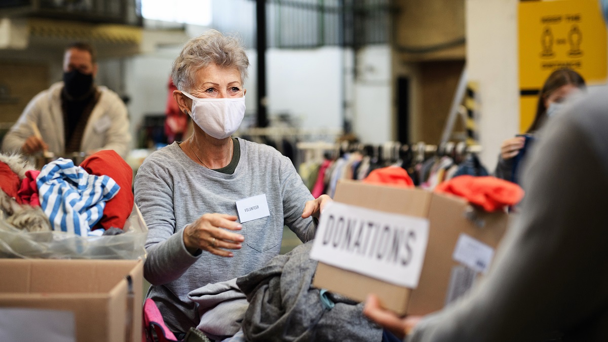 Volunteers sorting out clothing donations during COVID pandemic
