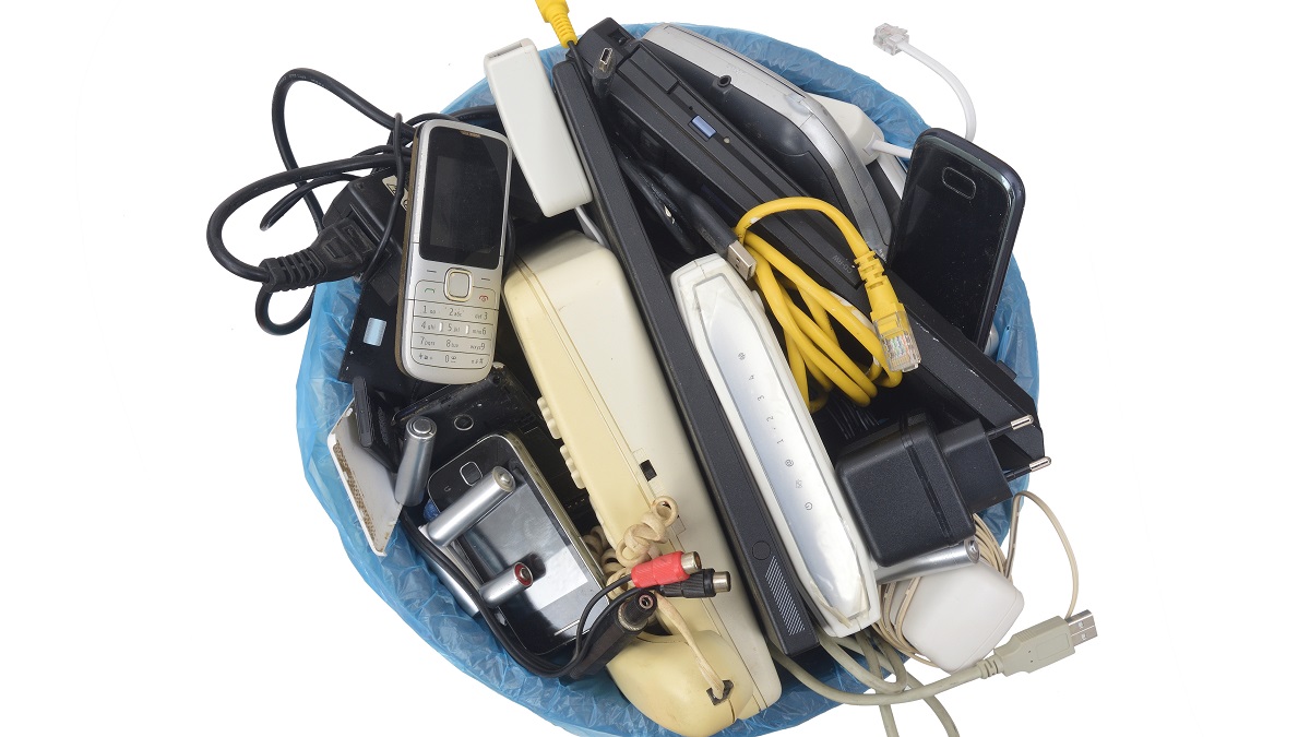 e-waste: assorted electronics in a bucket