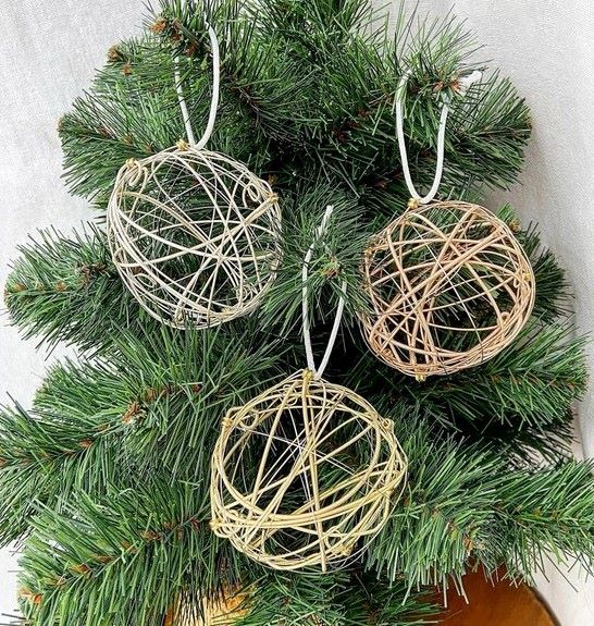 Upcycled guitar string ornaments
