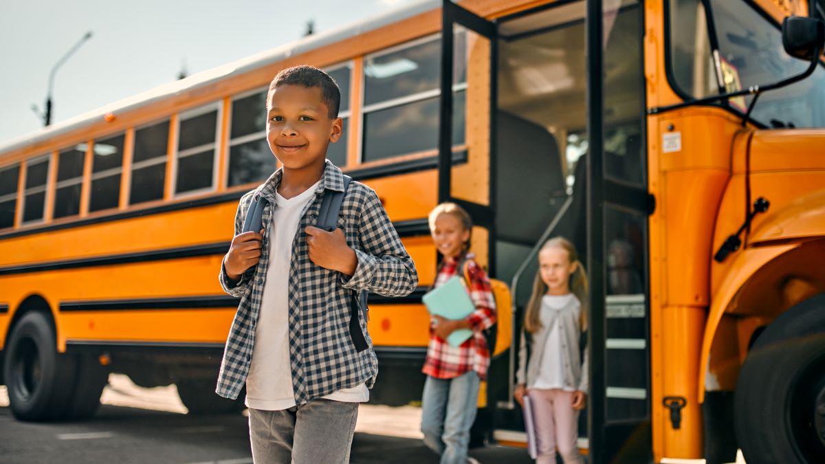 Children walking away from school bus