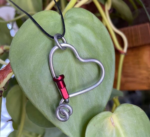Heart pendant made from upcycled bicycle spoke