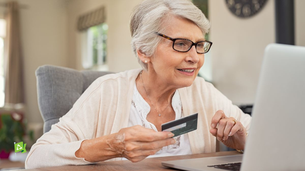 mature woman paying bills online