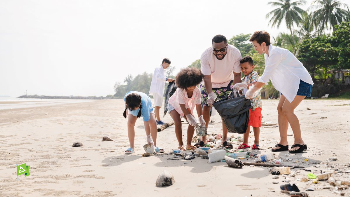Family cleaning garbage from a beach