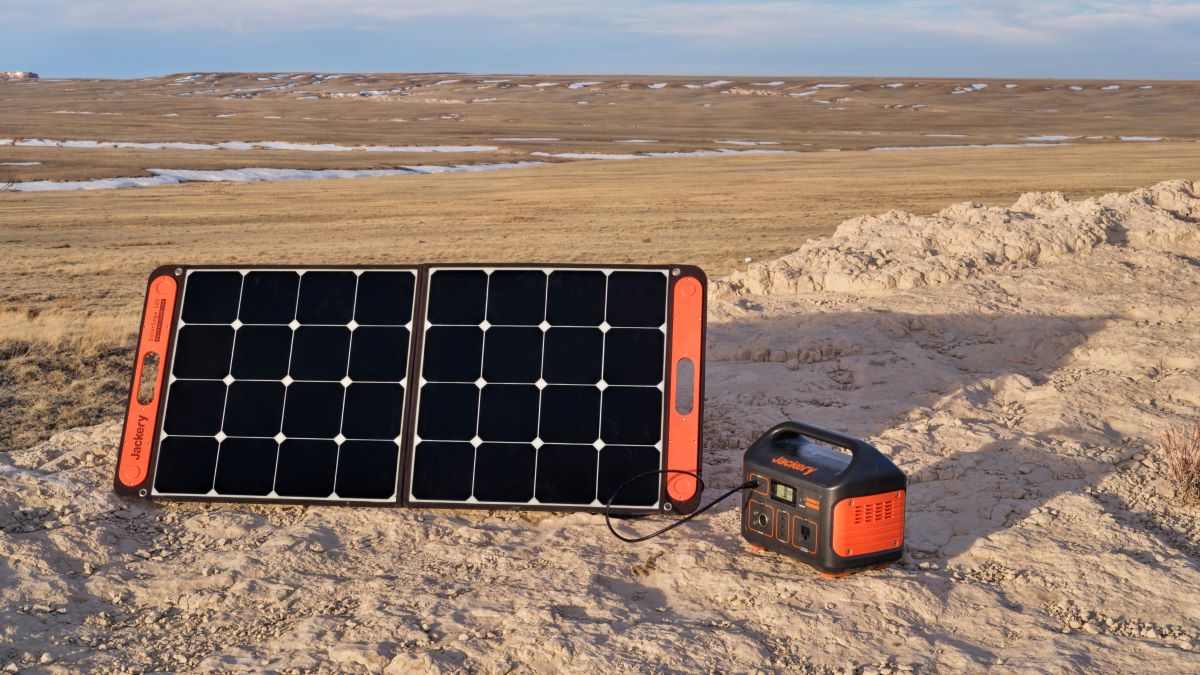 Portable solar power station charging in remote location